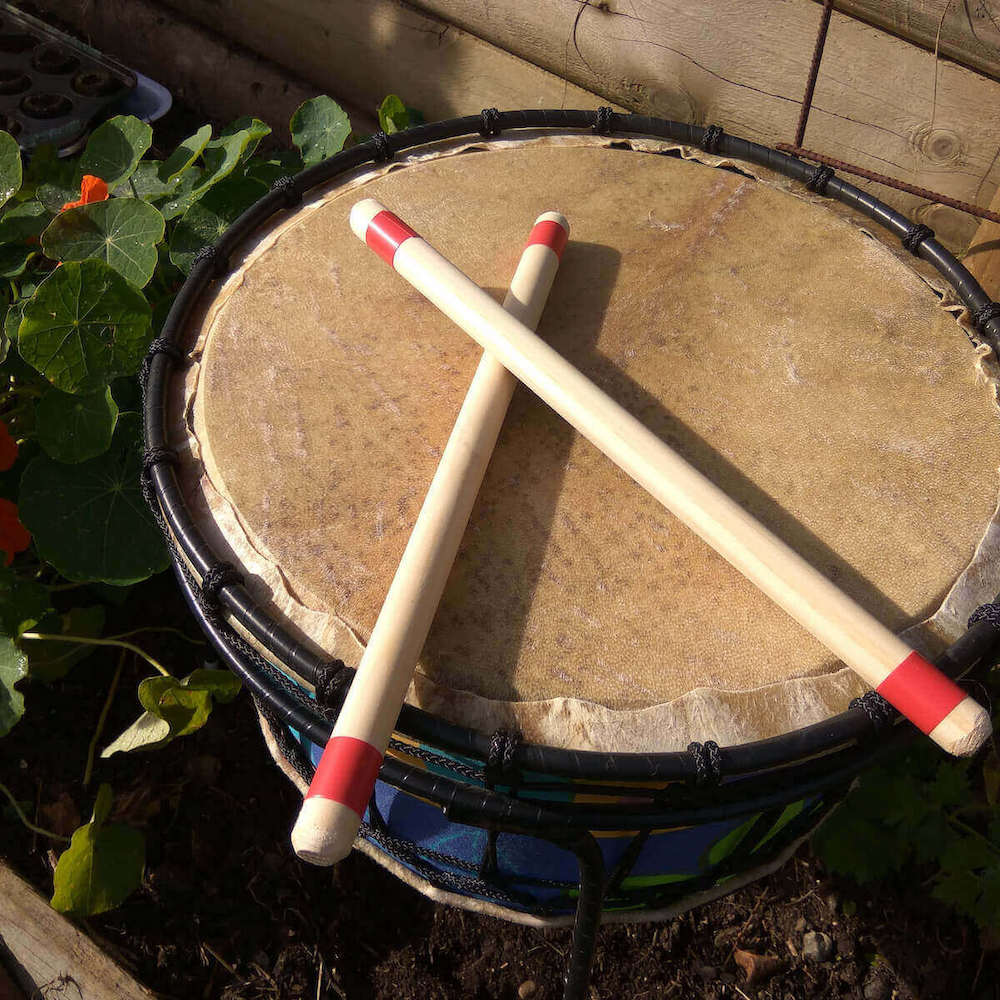 drumsticks on drum head drum sticks